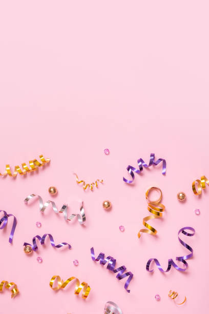 istock Festive spiral tinsel and beads for holiday decoration and celebration with copy space 1455762061