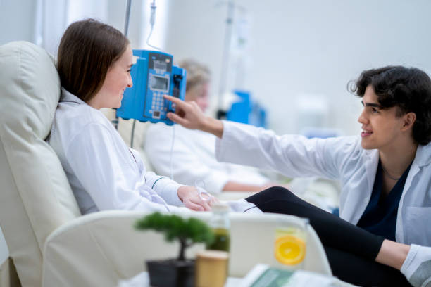 istock Medical Professional Checking on Vitamin Therapy Patients 1455765198