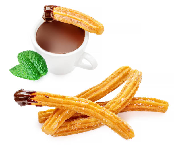 istock Churros - fried dough pastry with sugar and chocolate sauce dip isolated on a white background. Churro sticks, top view 1455770168
