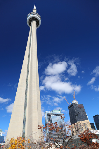 CN Tower in Toronto, Ontario, Canada shot on October 27, 2022.  The tower is a 553.3 meter-high concrete communications and observation tower built on the former Railway Lands.  Completed in 1976, its name \