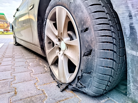 Car tire damaged after the accident
