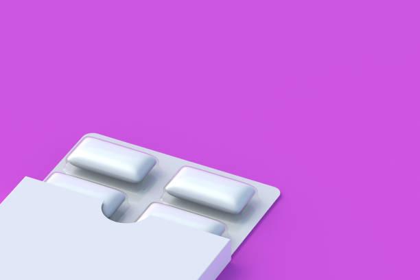 istock Chewing gums in blister packs. Mint bubblegum. Copy space. 3d render 1455771082
