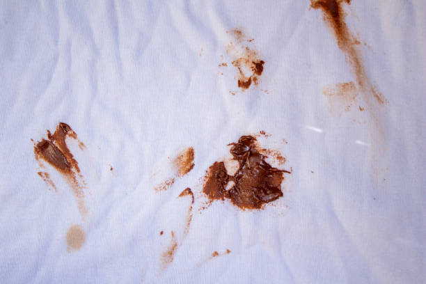 istock Chocolate stain on white shirt 1455771339