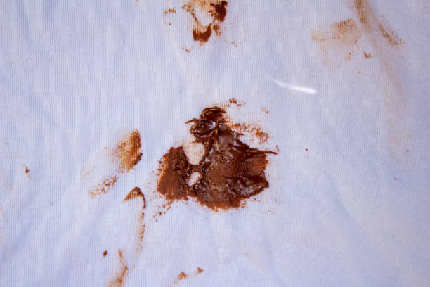 istock Chocolate stain on white shirt 1455771359