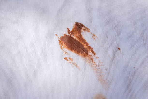 Chocolate stain on white shirt