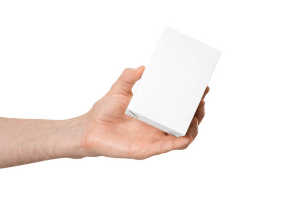 istock White box in a male hand, without inscriptions, isolate on a white background. 1455772932