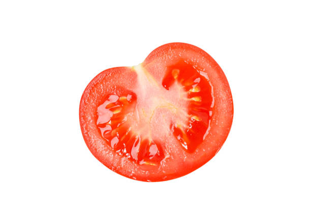istock Tomato cut in half. Fresh, juicy. Tomato. The angle is straight. Isolated. 1455773761