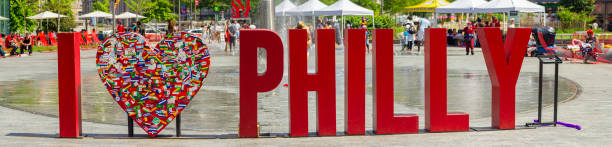 Philadelphia, Pennsylvania - May, 21st. 2011: Love Park  which was designed by Vincent Kling, was built in 1965.  The Love sculpture, designed by Robert Indiana, was first placed in the plaza in 1976 as part of the United States' Bicentennial celebration. The fountain flows from Spring thru Fall.