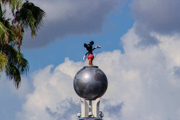 Orlando, FL, USA. August 17, 2016: Mickey Mouse statue at Hollywood Studios viewed from behind Orlando, FL, USA. August 17, 2016: Mickey Mouse statue at Hollywood Studios viewed from behind disney world stock pictures, royalty-free photos & images