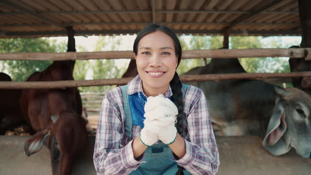 Portrait of female farmer small business livestock owner