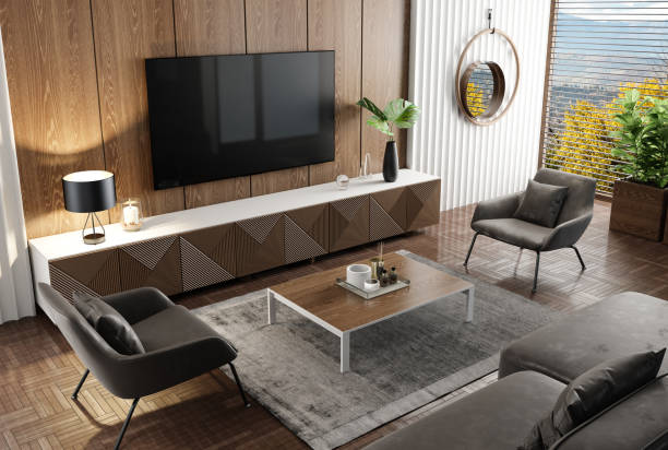 Luxury black and natural wood living room interior with 75" TV stock photo