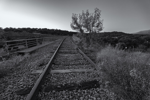 Abandoned railway tracks of an old railway line. Near Plasencia. Extremadura. Spain.