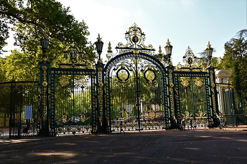 A view of the ornate metal gates at the entrance to the Parc de la Tete d’Or in the French city of Lyon.