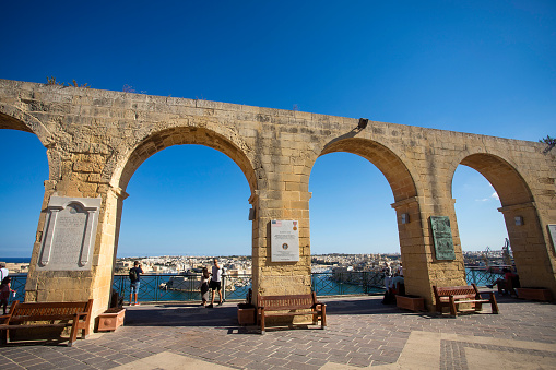 Valletta, Malta. October 7, 2022. Beautiful gardens with the arches of the terrace are a construction of the year 1661.