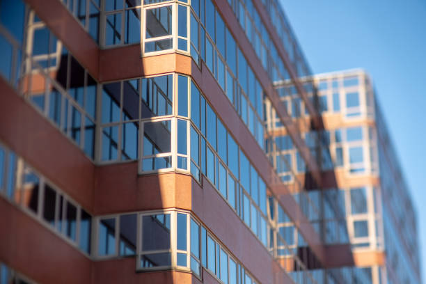 istock Windows of a red office building. 1455804538