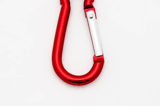 istock Shiny red and silver carabiner hook. 1455804583