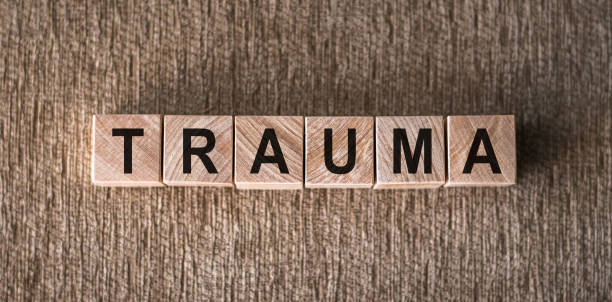 istock the word trauma written on wooden cubes 1455805070
