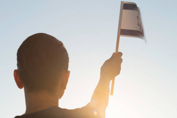 istock Woman with Flag 1455808641