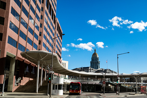 The Colorado State Capitol and Civic Center Station at the end of the 16th Street Mall in Denver, Colorado. On December 21st, 2022.