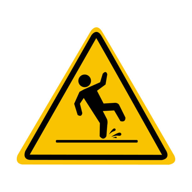 istock Slippery wet floor. The falling man is highlighted on the yellow triangle. Caution and warning. 1455811099