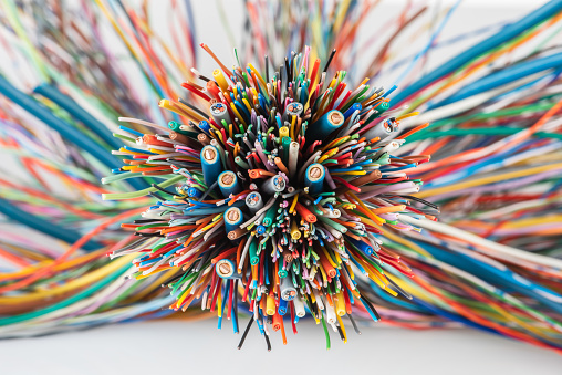 Bundle of colored electric cables closeup