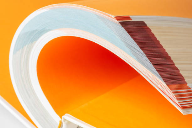 istock Hardcover book with rolled up pages 1455817645