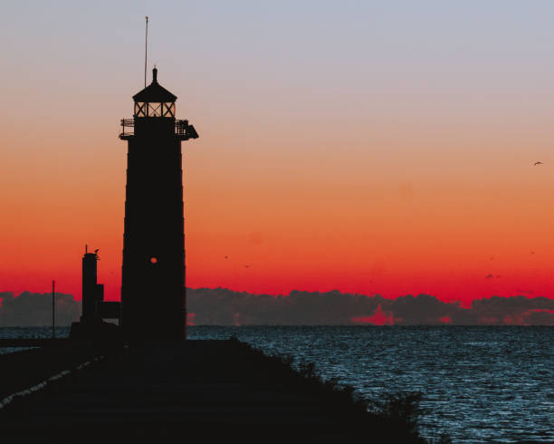 istock Beautiful view of a lighthouse against scenic sunset 1455818205