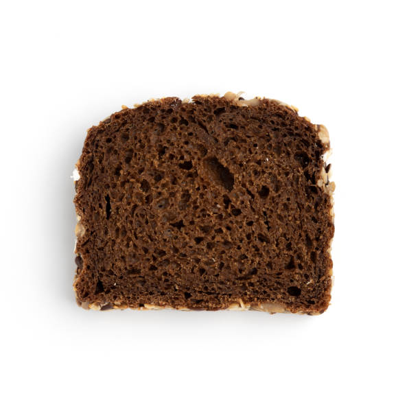 istock slice of rye bread on white background, top view 1455825229