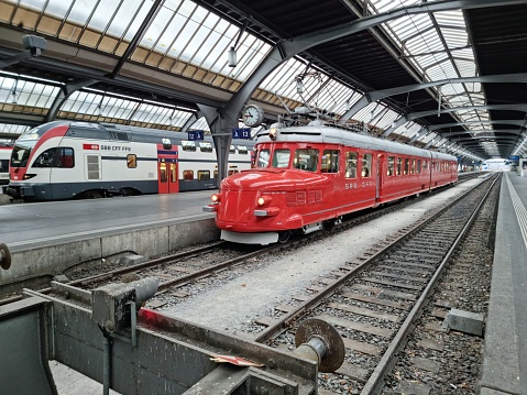 Holidays in Switzerland -  Sankt Moritz railway station with RhB trains