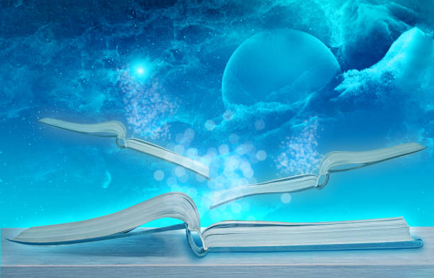 istock An open flying books under the outre space background.. 1455831586