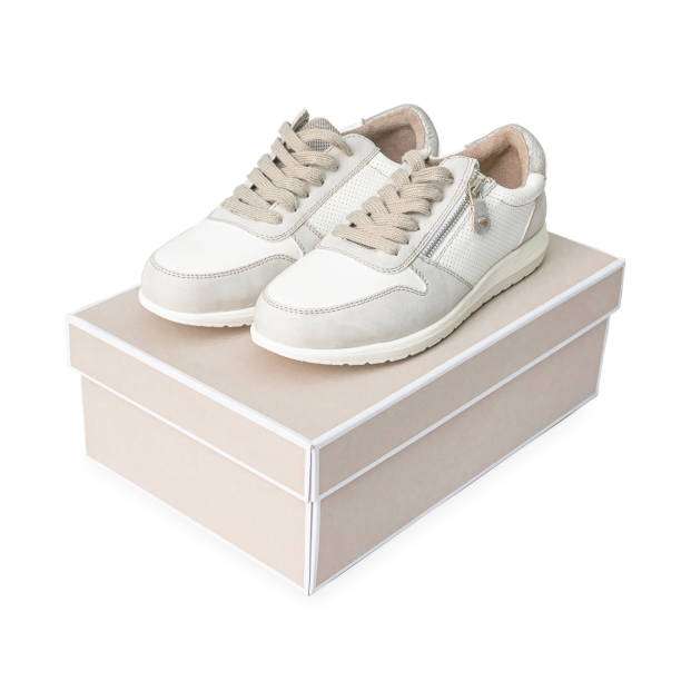 istock Sport boots on shoebox 1455832681