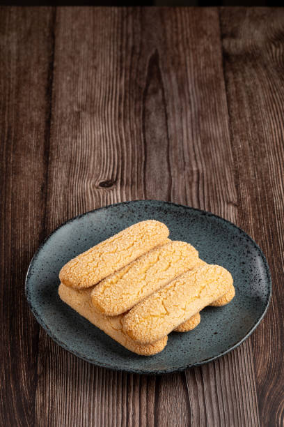 istock ladyfingers cookies on the table. 1455839497