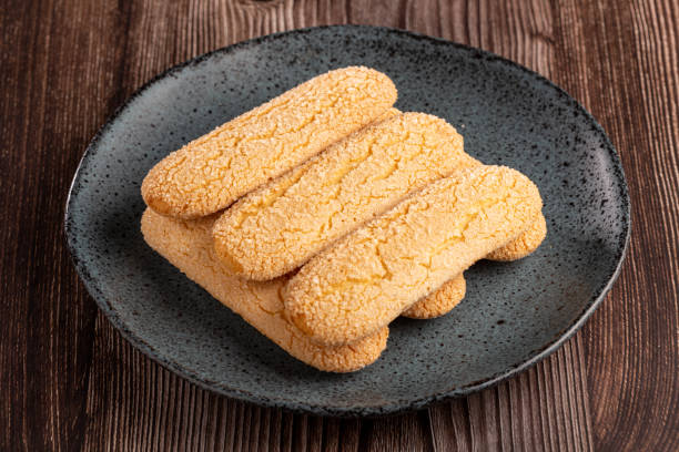 istock ladyfingers cookies on the table. 1455839615