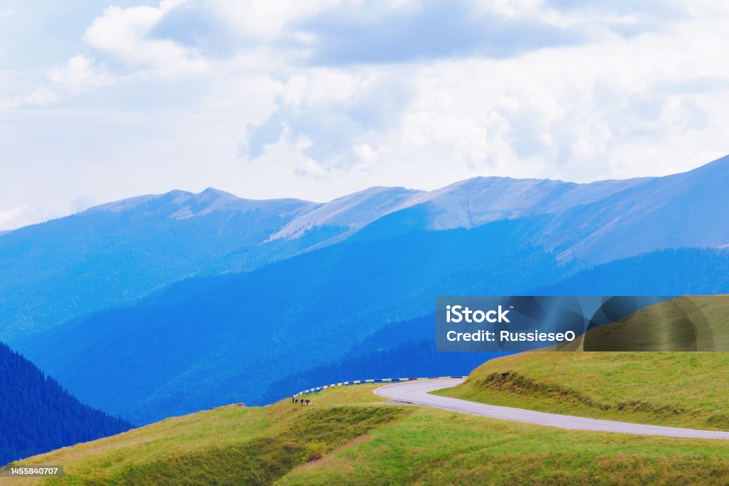Transfagarasan road in Carpathian mountains Transfagarasan road in Carpathian mountains in Romania . Blue mountains range Mountain Stock Photo