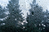 Water drops on a glass.  Heavy rain on a window.