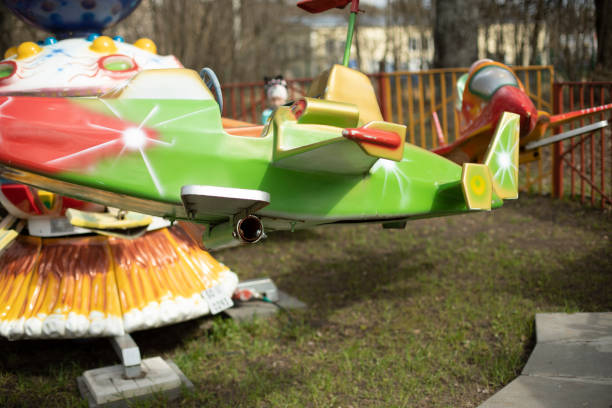 Children's attractions in park. Play plane for kids. Fun place to relax.