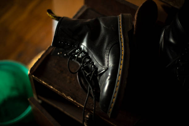 istock Black shoe. Shoes in hallway. Autumn boots. 1455846141