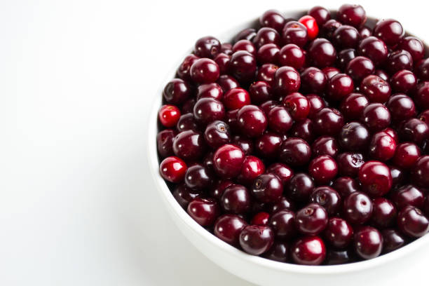 istock Cherry on a white background, a beautiful screensaver on your phone, a web article about cooking and the benefits of cherry berries. The content of all macro elements in the cherry berry. 1455847364