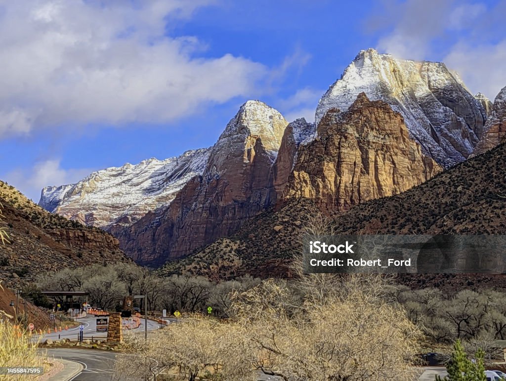 Entrance to Zion National Park with a view of East Sentinel and other peaks snow covered in early January 2023 Cliff Stock Photo