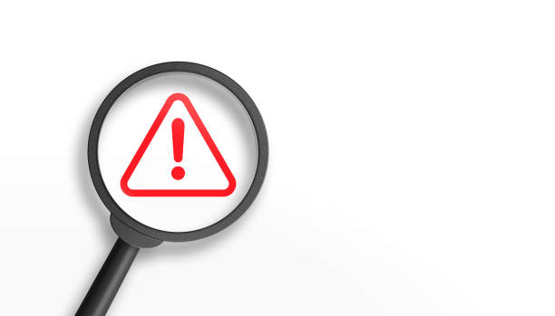 istock Magnifier glass with red triangle caution warning sign on white background for notification error and maintenance concept. 3d illustration. 1455849487