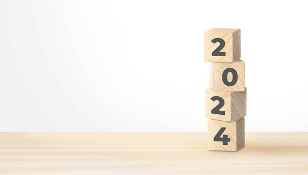 istock 2024 year numbers on wooden cube blocks stack on white background with copy space. 2024 Happy New year banner. 3D illustration. 1455849523