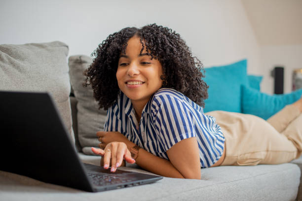 istock Young woman working from home 1455849747