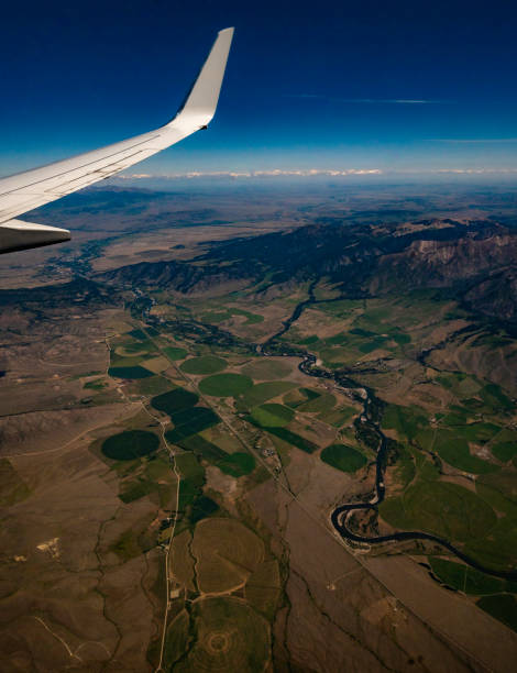 istock Air travel airplane wing and scenics 1455851046