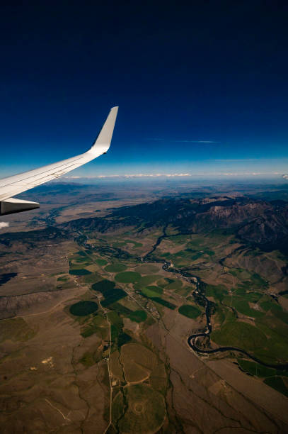 istock Air travel airplane wing and scenics 1455851047