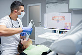 Dental procedure with the help of 3D tooth scanner technology.