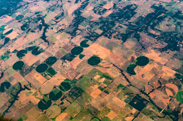 istock Earth from above, aerial landscape crop circles and agricultural fields patterns 1455852439