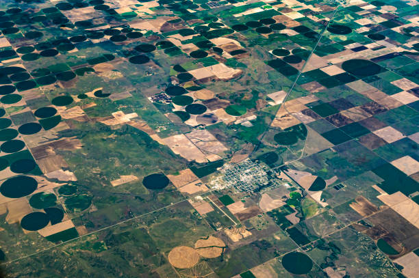 istock Earth from above, aerial landscape crop circles and agricultural fields patterns 1455852536
