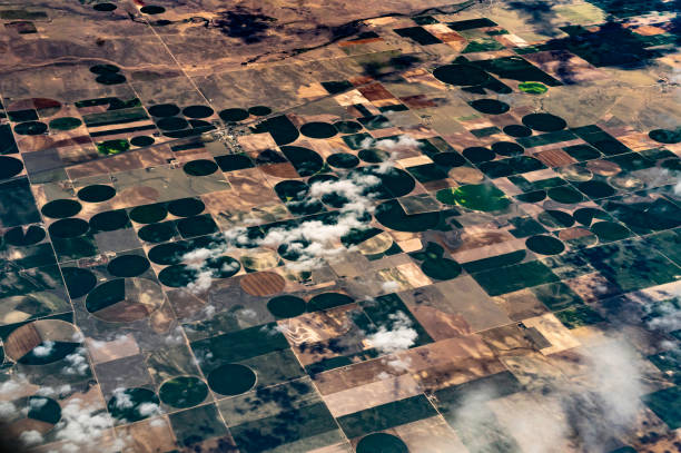 istock Earth from above, aerial landscape crop circles and agricultural fields patterns 1455853267