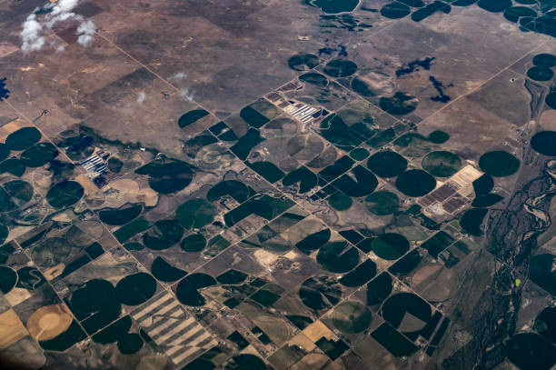istock Earth from above, aerial landscape crop circles and agricultural fields patterns 1455853317