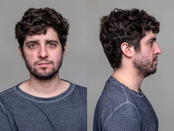 serious man front and profile mugshots - mugshot stockfoto's en -beelden